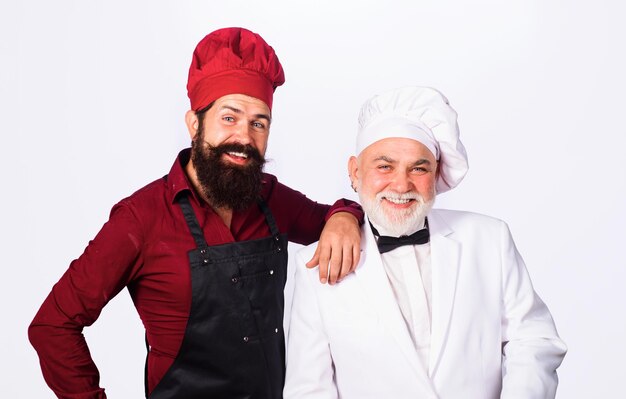Two chefs smiling
